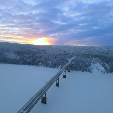 Bridge across a frozen river, Dalton Highway, Alaska