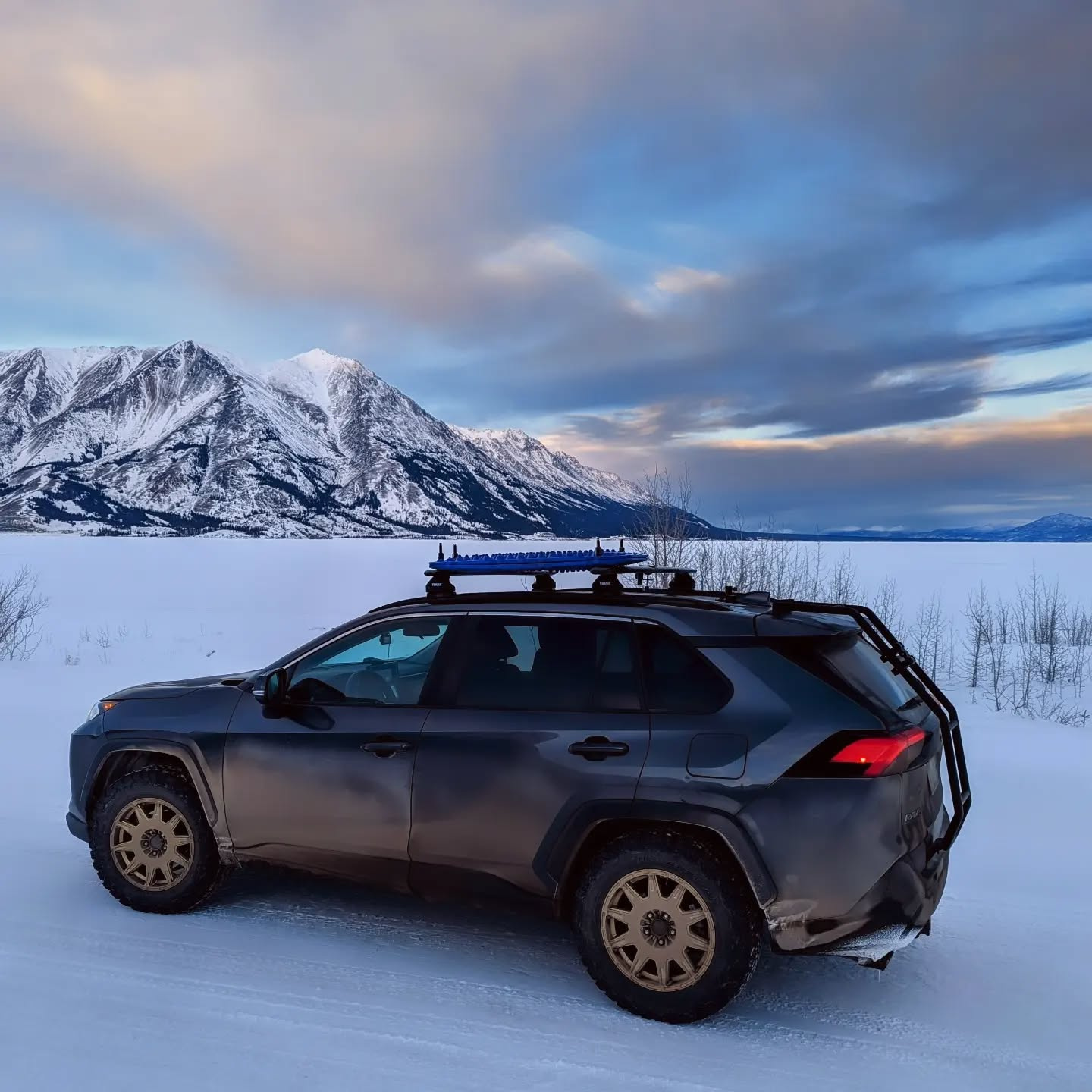 My RAV4 beside frozen Kluane Lake, Yukon, in December 2023